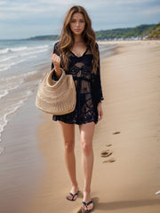 Model wearing black Lace V-Neck Three-Quarter Sleeve Cover Up with beach bag, showcasing elegant beachwear style in swimwear cover ups.