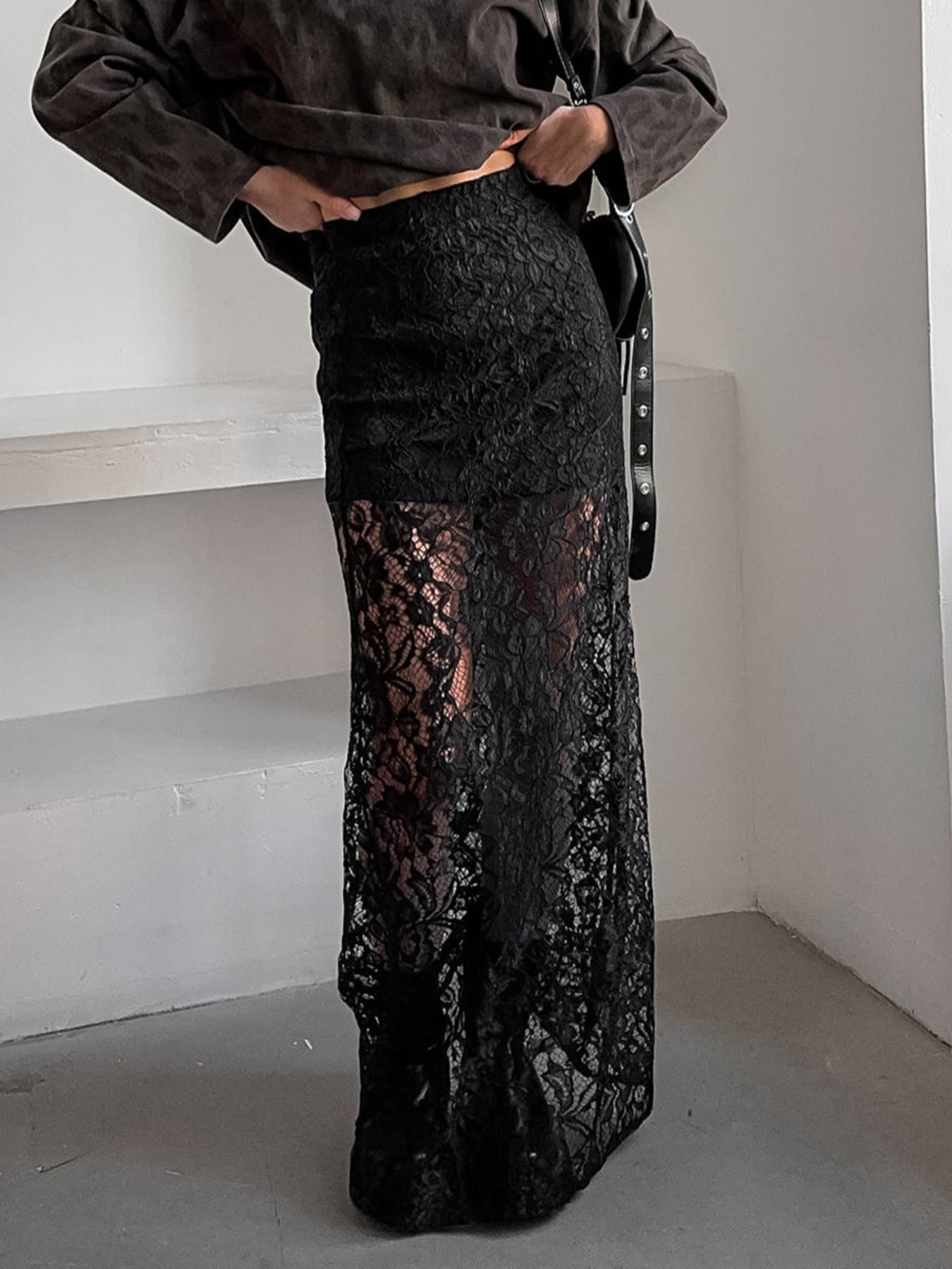 Lace Sheer Maxi Skirt styled with a fitted waist and floral lace details, perfect for summer chic outfits.