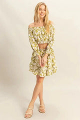 Full front view of HYFVE Floral Off-Shoulder Flounce Sleeve Top and Skirt Set styled with sandals, showcasing a breezy and feminine summer outfit.