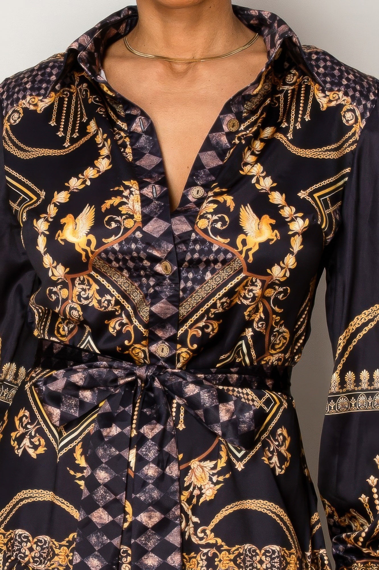 Resort Wear Maxi Dress in black with gold baroque patterns, showcasing luxury and elegance for upscale vacation moments.