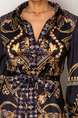 Resort Wear Maxi Dress in black with gold baroque patterns, showcasing luxury and elegance for upscale vacation moments.