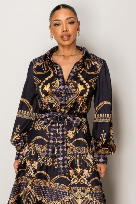 Woman wearing Resort Wear Maxi Dress with gold baroque pattern for luxurious vacation style.