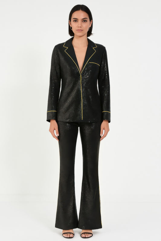 Woman wearing Sequin Collared Two Piece Set with tailored blazer and straight-leg pants, featuring contrast trim and allover sequins.