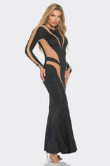 Model wearing Mesh Cut Out Detail Maxi Dress with long sleeves and mesh inserts, showcasing a sleek silhouette with a metallic shimmer.