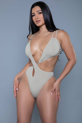 Front view of nude Eliana Swimsuit with plunging neckline and crisscross waist, designed for confident style and adjustable comfort.