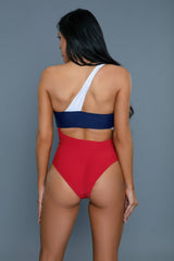 Rear view of Kennedy Swimsuit in patriotic red, white, and blue, highlighting one-shoulder strap and high-cut leg design.