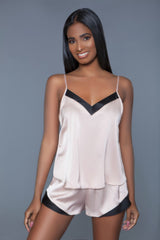 Natalie Satin Set GirlSavvi features a blush pink satin cami top with black V-neck trim and matching shorts, ideal for stylish sleepwear or loungewear.