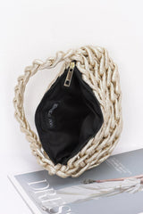 Interior view of the gold Metallic String Handmade Tote Bag showing black fabric lining and gold zipper closure for secure storage.
