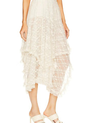 Asymmetrical lace midi skirt with sheer detailing, featuring a modern silhouette and elegant design, perfect for evening wear.