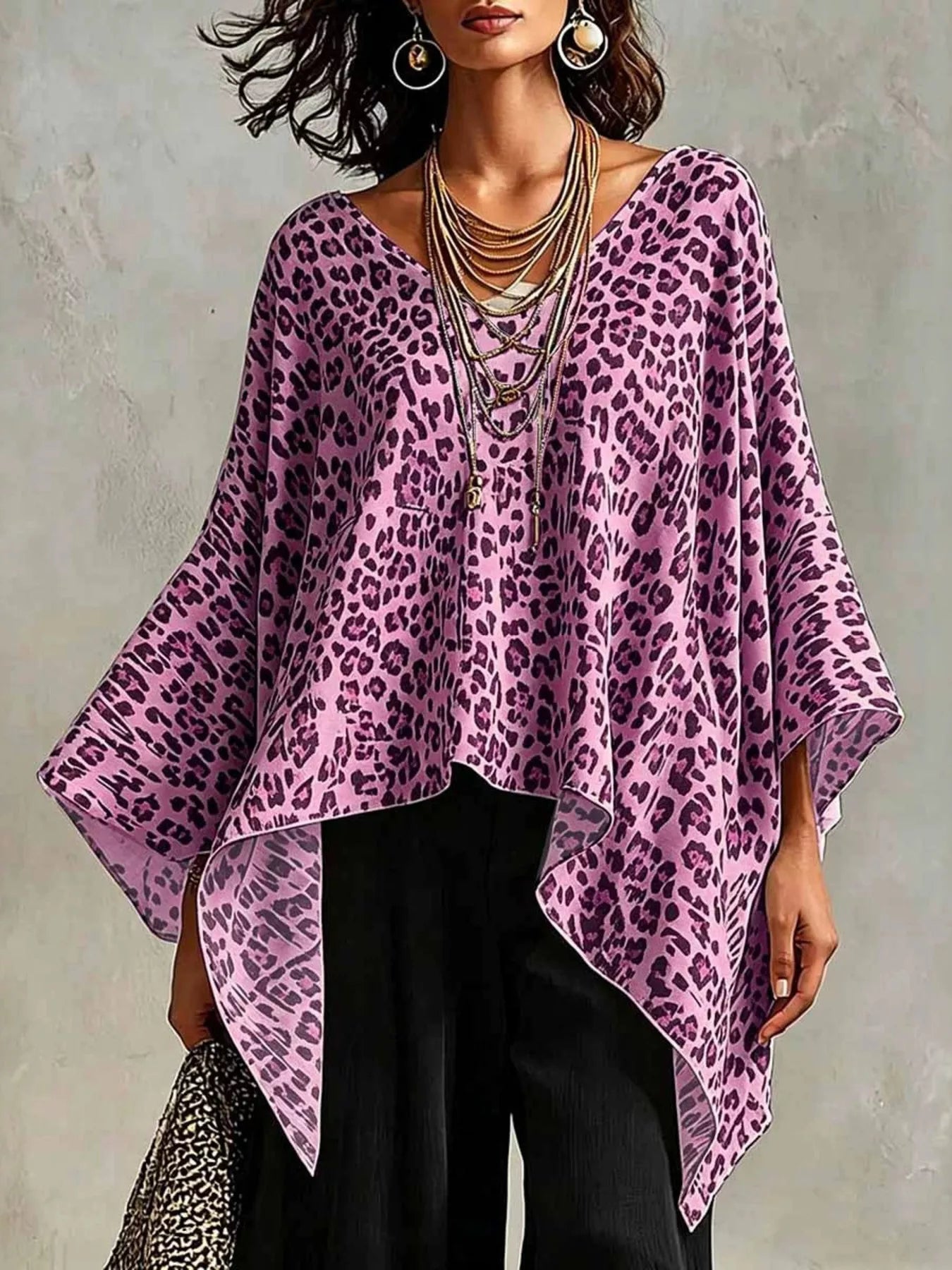 Asymmetrical Leopard Print Top Plus Size in pink with stylish drape and layered necklaces worn by model.