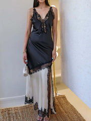 Black Cream Lace Trimmed Two-Tone Slip Dress worn by a model, featuring lace detailing and a split design.