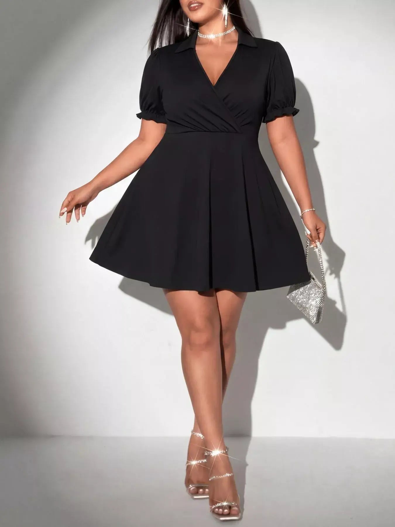 Black Plus Size Short Sleeve Mini Dress featuring a collared V-neckline and flared skirt, perfect for any occasion.