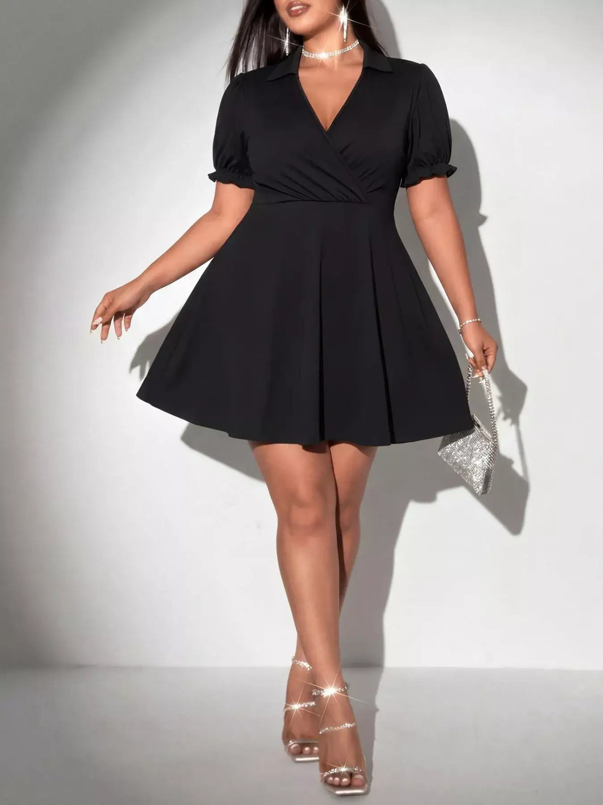 Black Plus Size Short Sleeve Mini Dress featuring a collared V-neckline and flared skirt, perfect for any occasion.