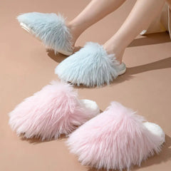 Assorted fluffy round toe flats slippers in pink and blue, showcasing comfy PVC design for fashionable indoor wear.