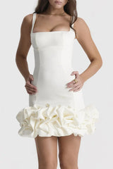 Front view of white Ruched Square Neck Sleeve Mini Dress by GirlSavvi, showcasing fitted silhouette and dramatic ruffled skirt.