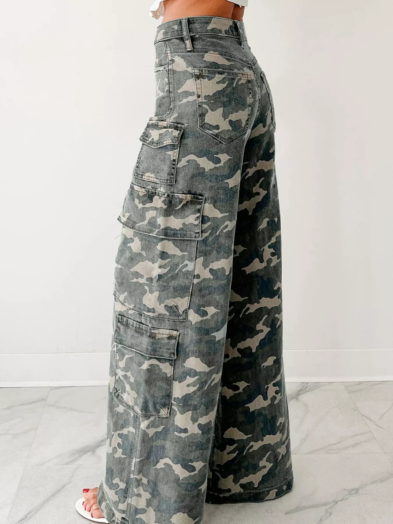 Camo Print Wide Leg Cargo Jeans with utility-inspired pockets, shown in a modern street-style look, perfect for casual outings.