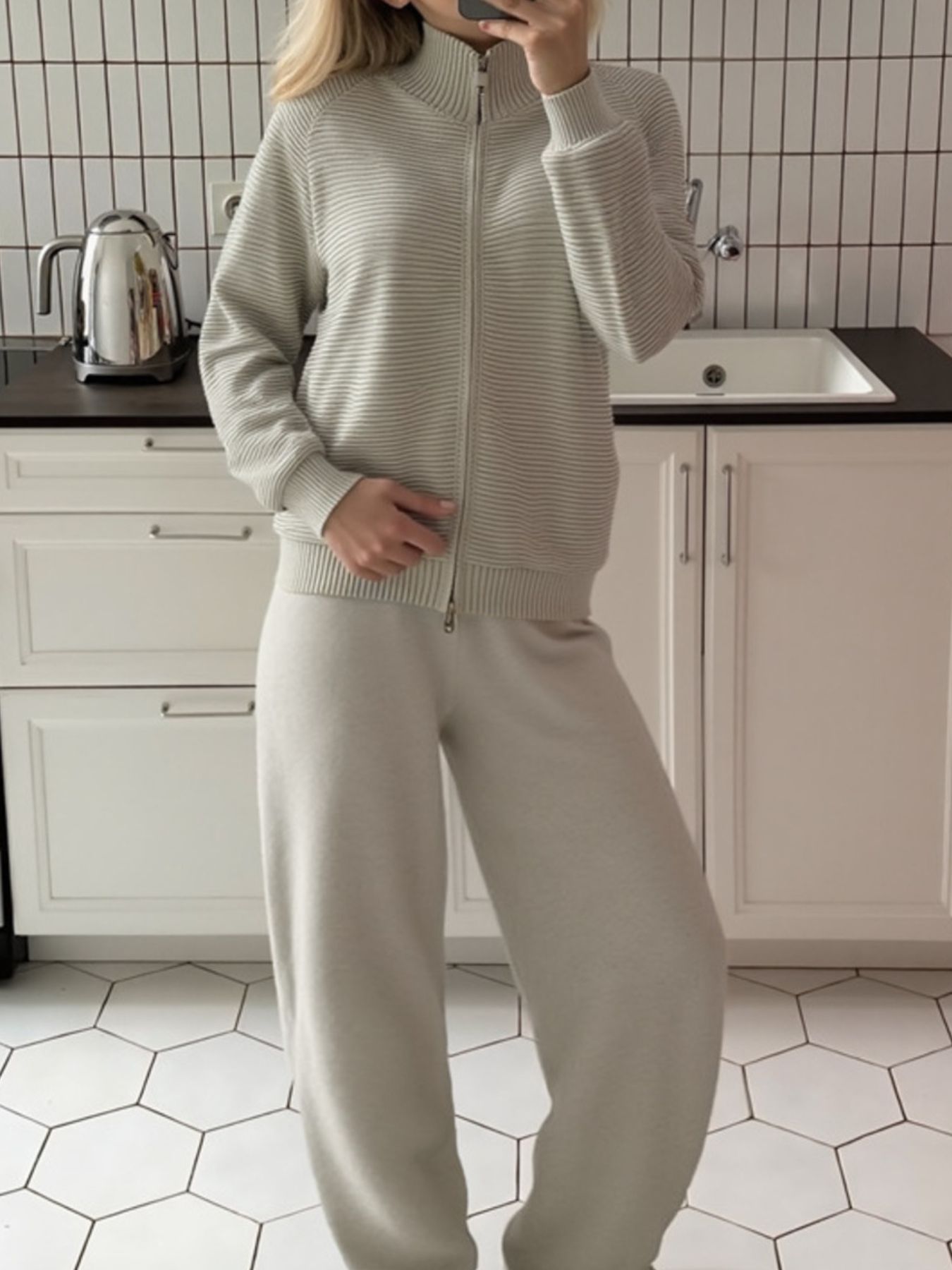 Casual Knit Cardigan and Wide-Leg Pants Set worn by a model in a kitchen setting.