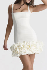 Close-up of white Ruched Square Neck Sleeve Mini Dress from GirlSavvi, featuring structured bodice and voluminous ruffle hem.