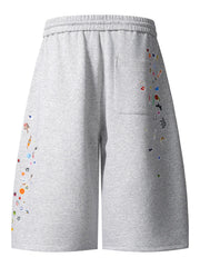 Cotton Printed Drawstring Casual Shorts with colorful graphic accents on a gray background.