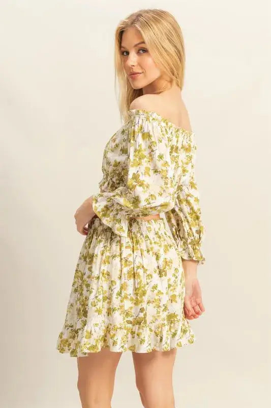 Back view of HYFVE Floral Off-Shoulder Flounce Sleeve Top and Skirt Set with gathered detailing and soft floral pattern, great for warm-weather style.