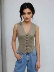 Model wearing Plaid Button Down Vest | Savvy, featuring a buttoned front, classic look, and lined interior for comfort.