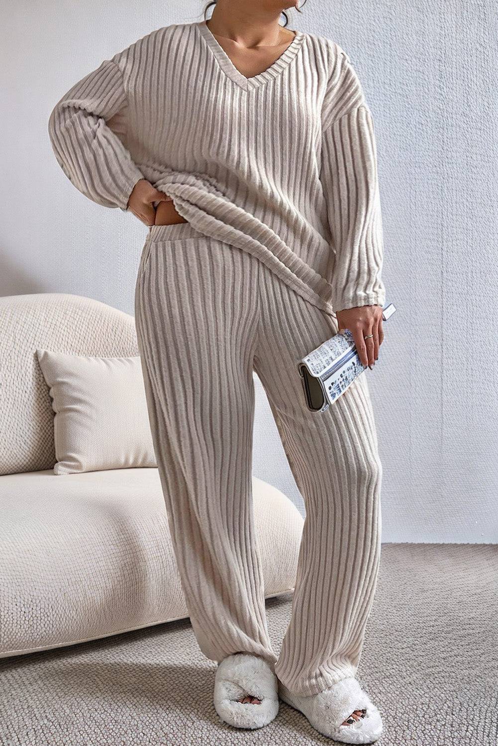 Plus Size Ribbed V-Neck Drop Shoulder Top and Pants Set in beige with a relaxed fit, ideal for curvy loungewear. Features soft ribbed texture and V-neck.