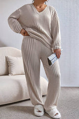 Plus Size Ribbed V-Neck Drop Shoulder Top and Pants Set in beige with a relaxed fit, ideal for curvy loungewear. Features soft ribbed texture and V-neck.