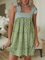 Printed Square Neck Tie Shoulder Mini Dress in green with blue floral pattern and striped shoulder ties for summer outings.