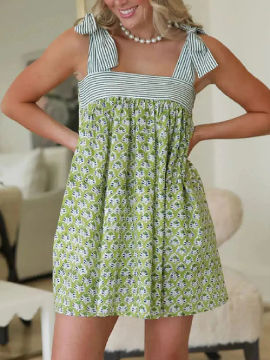 Flowy green Printed Square Neck Tie Shoulder Mini Dress with floral print and striped neckline, perfect for warm weather.