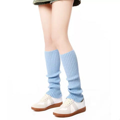 Ribbed Knit Leg Warmers in light blue styled with sneakers for a trendy winter look, providing warmth and texture to any outfit.