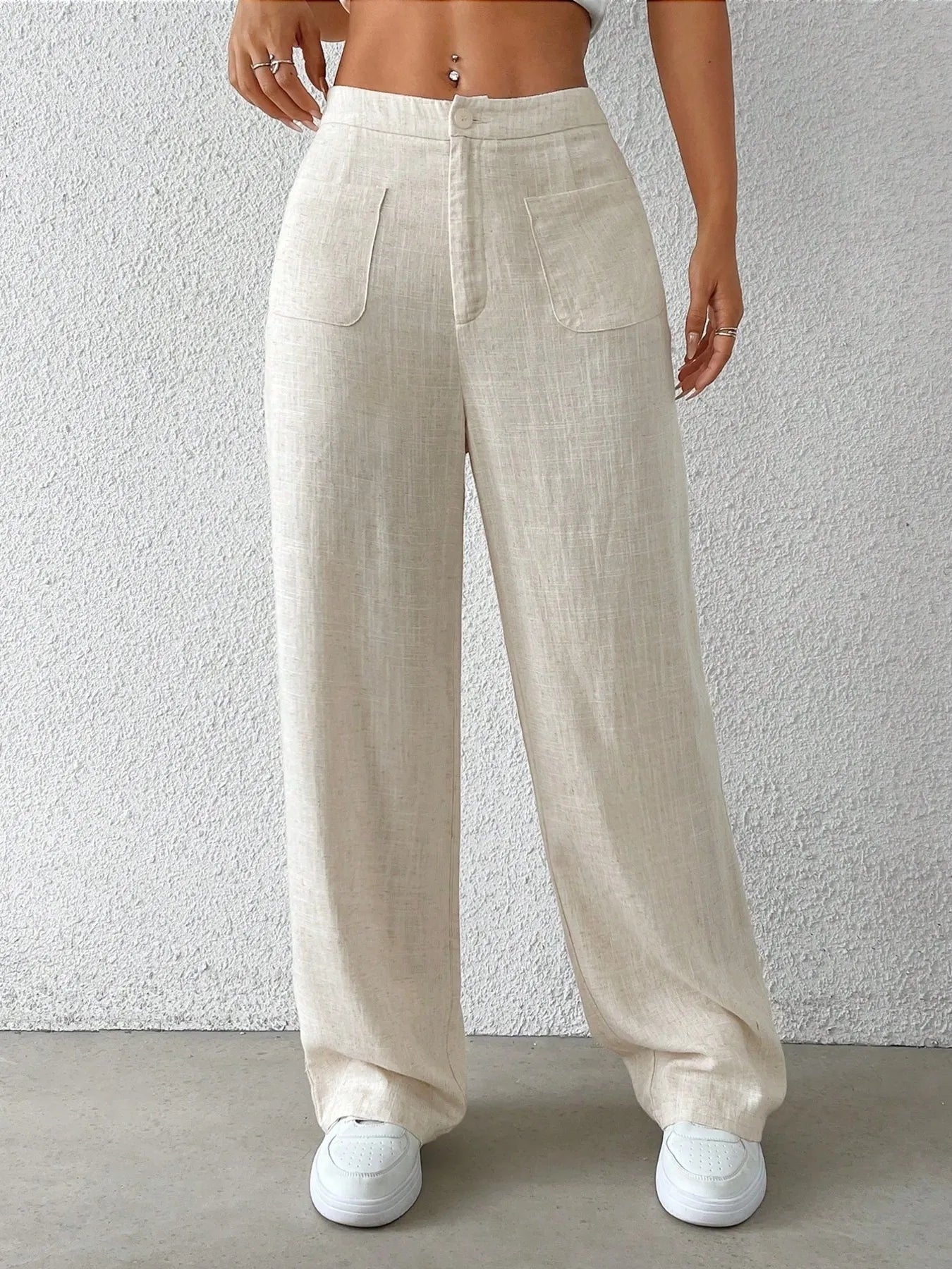 Fashionable Chic Wide-Leg Pants by GirlSavvi in light beige with pockets, perfect for a stylish casual look.