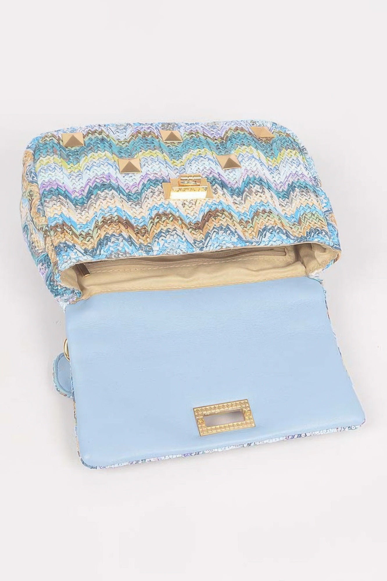 Faux Straw Flap Top Handle Bag with a colorful textured design and interior view, showcasing a flap closure.