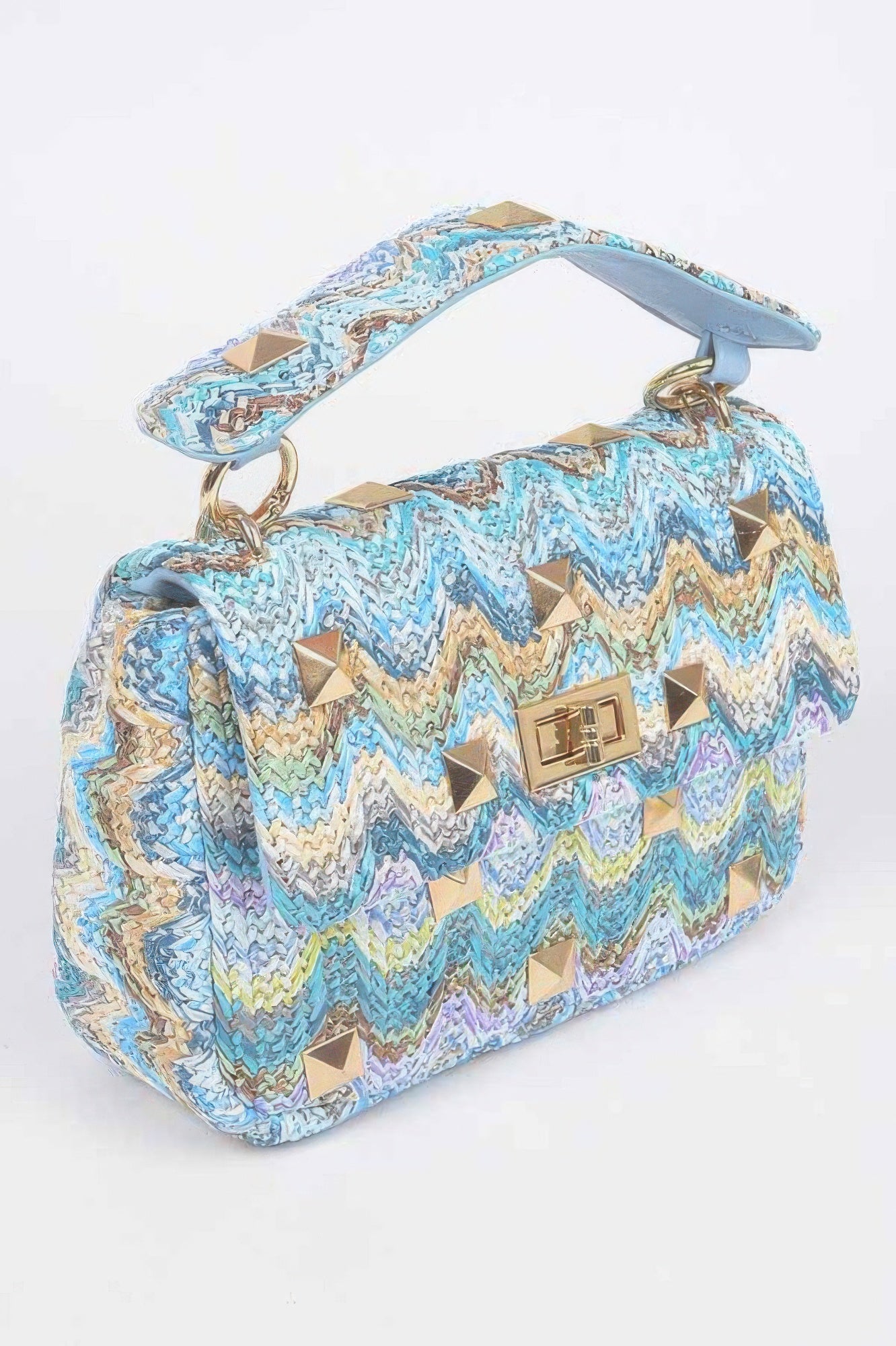 Faux Straw Flap Top Handle Bag with textured weave and gold studs in blue and pastel colors.