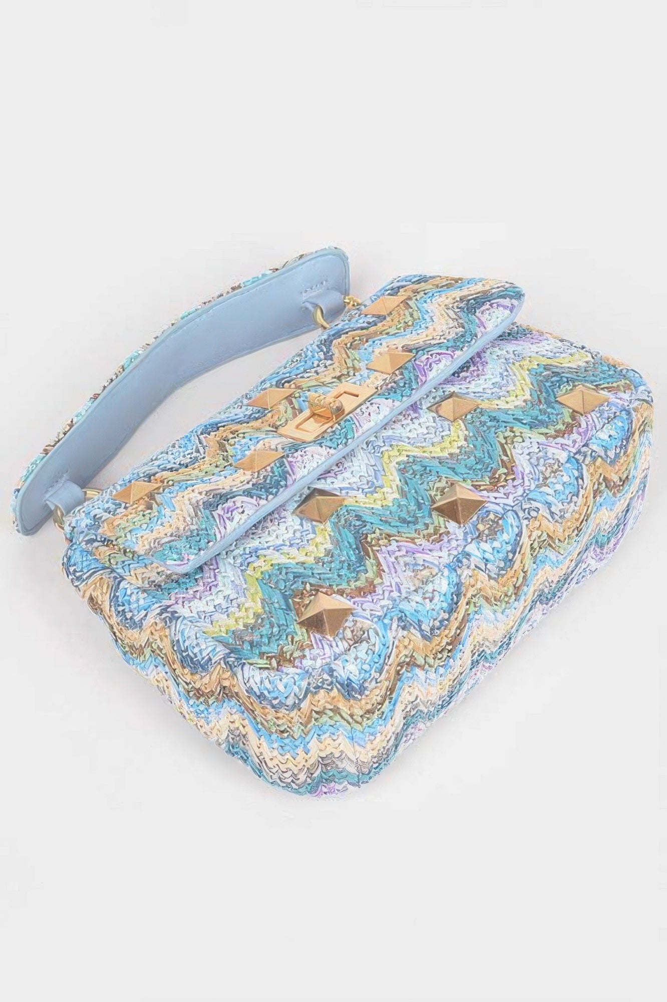 Faux Straw Flap Top Handle Bag featuring a stylish zigzag pattern with a top handle and gold accents.