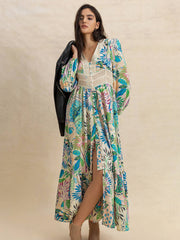 Effortlessly Chic Slit Printed V-Neck Long Sleeve Midi Dress paired with a black jacket, highlighting its boho floral design and slit detail.