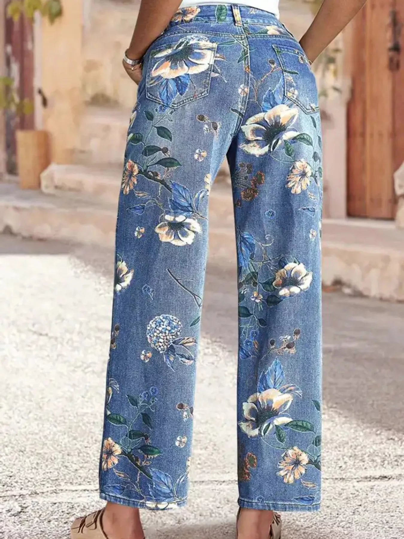 Back view of Floral Print Wide Leg Jeans showcasing vibrant floral design on denim, perfect for summer chic style.