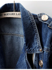 Close-up of the collar and buttons of the GirlSavvi Zip Denim Jacket, showcasing its unique design and style.
