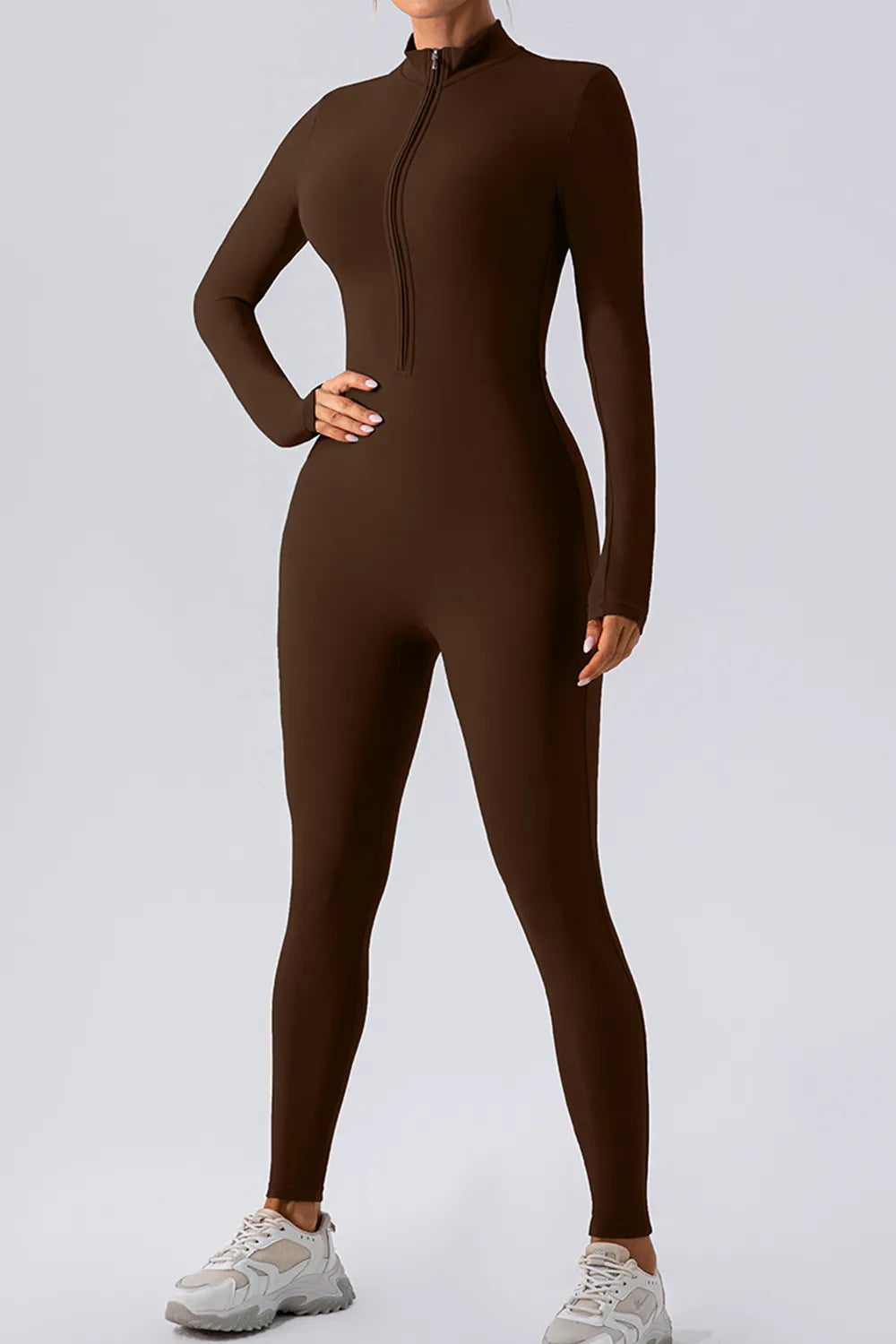 Half Zip Mock Neck Active Jumpsuit in brown, designed for fitness with a sleek mock neck and front half-zip closure.