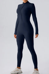 Half Zip Mock Neck Active Jumpsuit in navy color, showcasing sleek design and front half-zip closure for active wear.