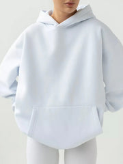 Kangaroo Pocket Long Sleeve Hoodie with soft fabric, featuring a convenient pocket and slight stretch for comfort and style.