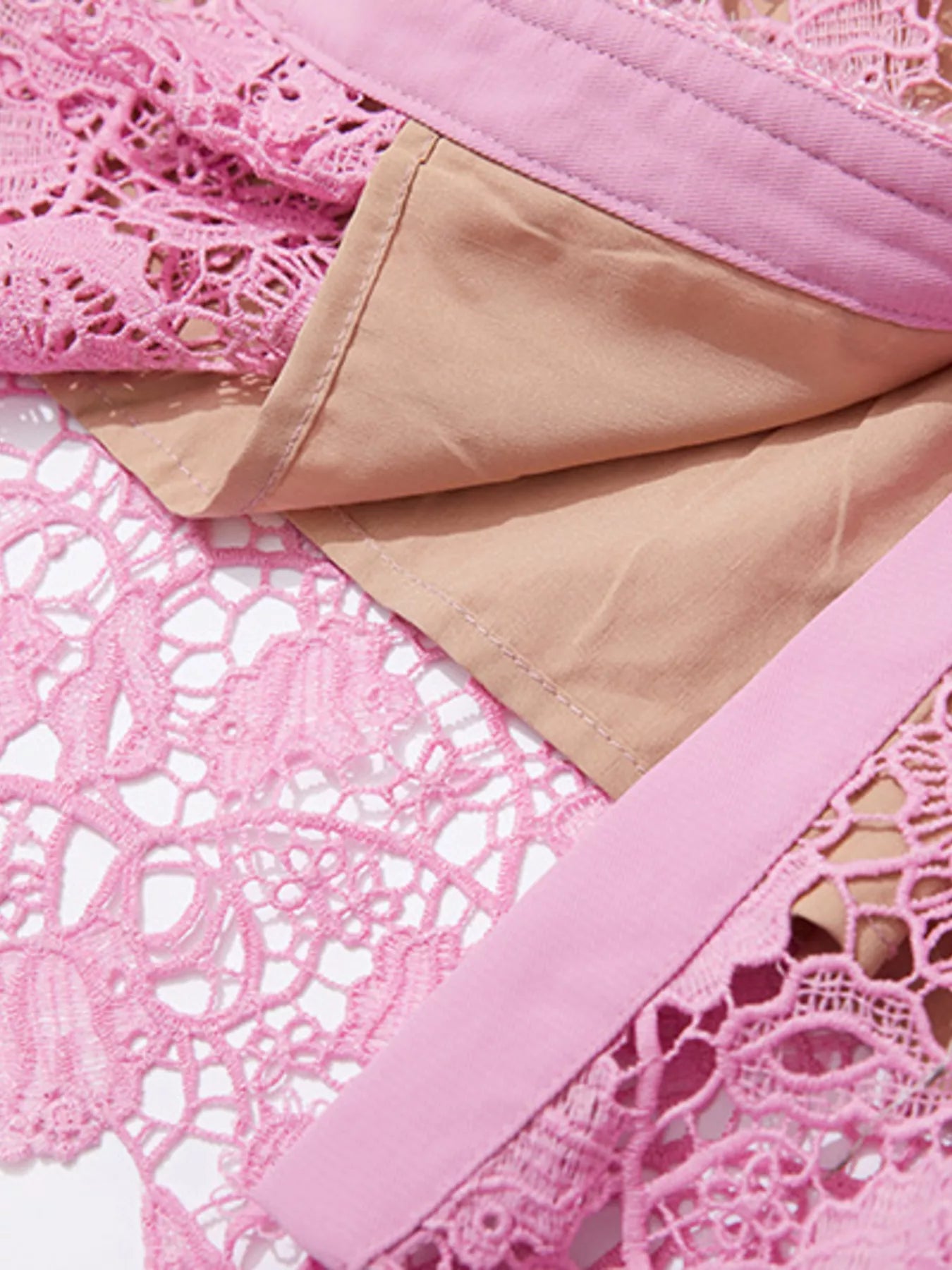 Detail of the Lace Button-Up Midi Dress | Savvi showcasing delicate pink floral lace and soft lining.