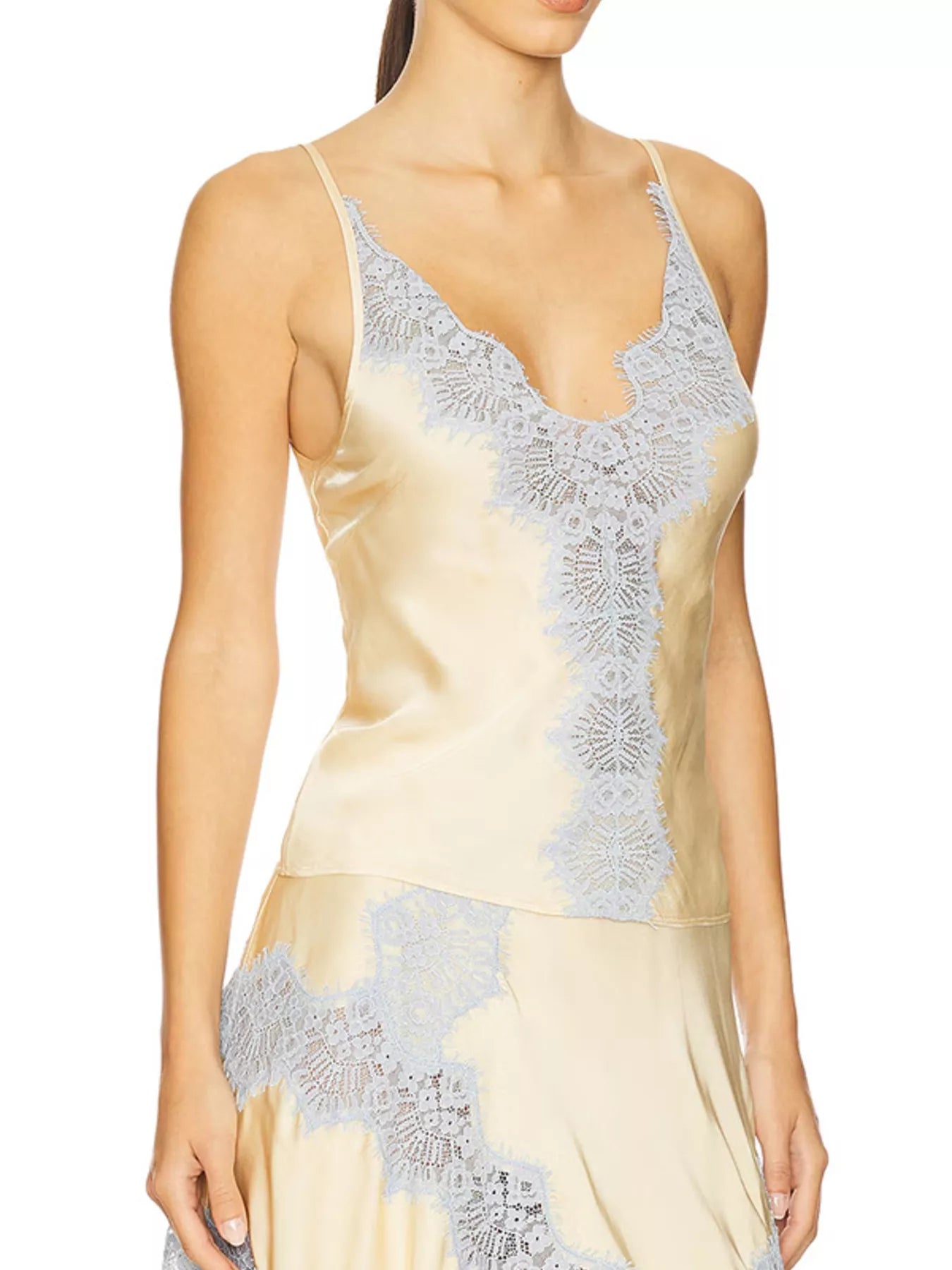 Model wearing Lace Detail Cami and Skirt Set featuring intricate lace detailing and a soft sheen.