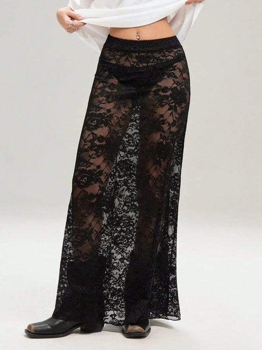 Chic sheer black lace maxi skirt perfect for layering, featuring elegant lace design with a bold, stylish touch.