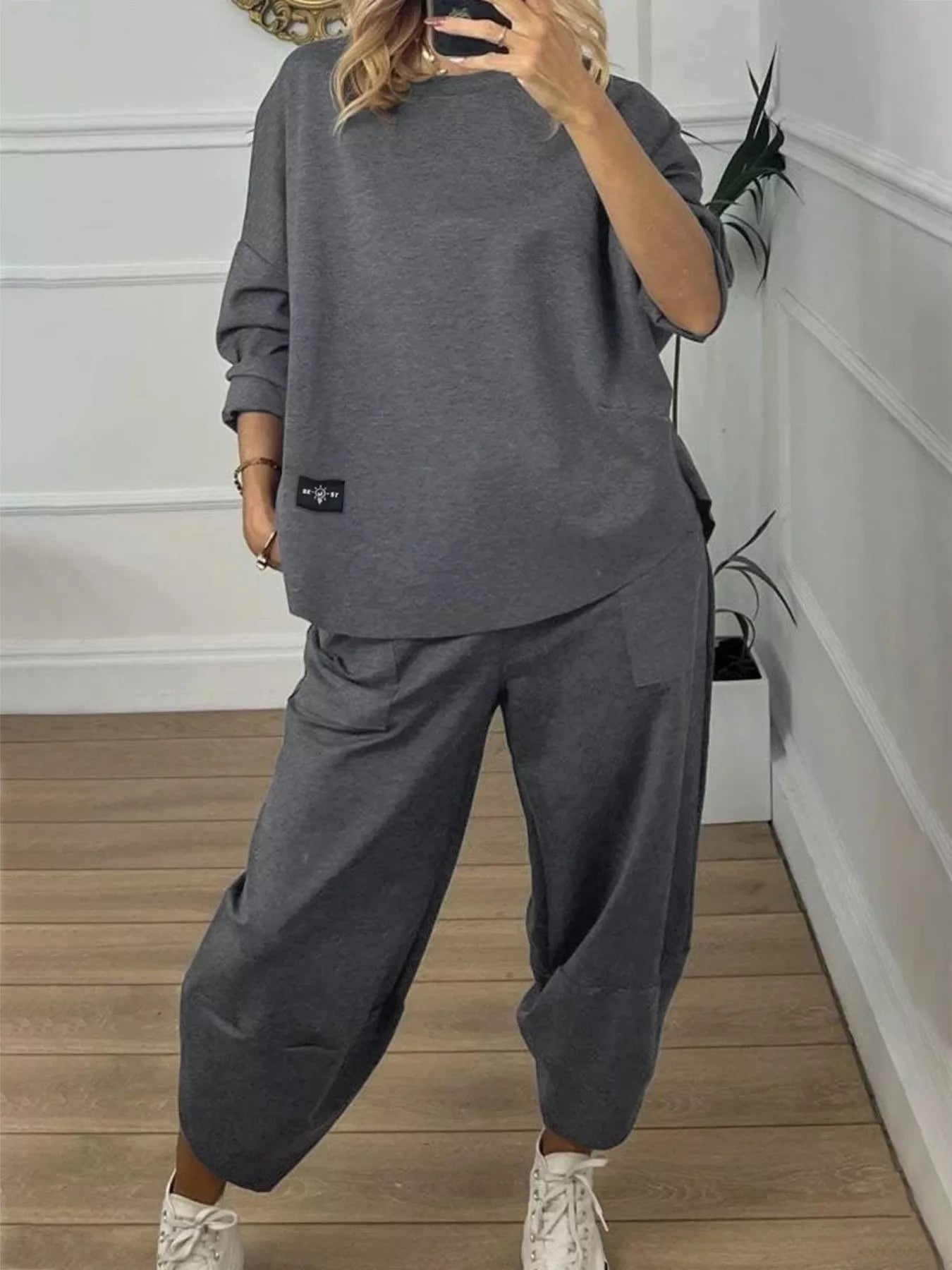 Casual Loose Fit Top and Pants Two-Piece Set featuring a relaxed long-sleeve top and matching pants in gray.