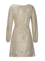 Back view of shimmering Midnight Muse Dress with adjustable tie-waist, showcasing elegant chic style.