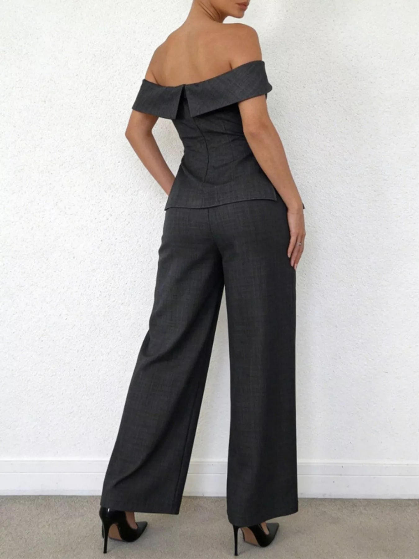 Off-Shoulder Top and Wide-Leg Pants Set showcased on a model, highlighting the stylish back and flowing silhouette.