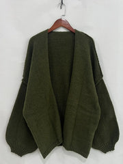 Olive oversized open front dropped shoulder cardigan with textured fabric, featuring voluminous sleeves. Perfect for layering in chic style.