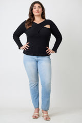 Plus Size Black Ribbed Cutout Long Sleeve Top worn with light blue jeans, showcasing a modern style and fitted silhouette.
