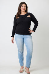 Plus Size Black Ribbed Cutout Long Sleeve Top worn with light blue jeans, showcasing its stylish asymmetrical neckline and crossover detail.