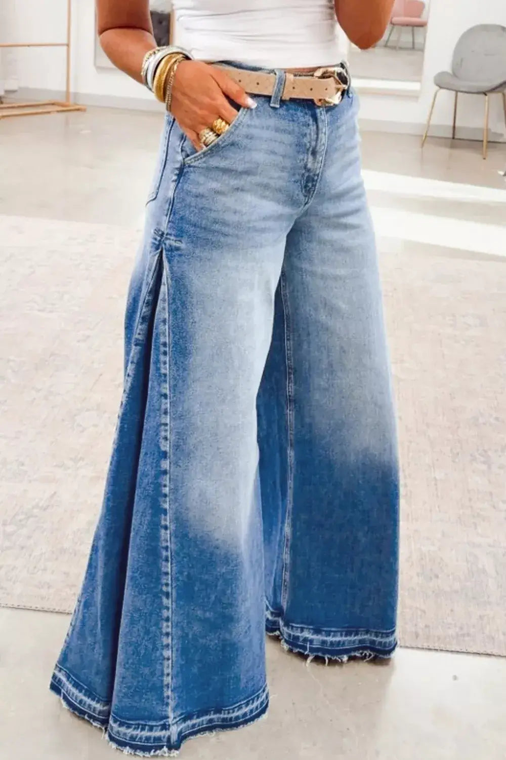 Side Seam Gathering Flare Leg Jeans featuring gathered side seams and a two-tone washed finish.